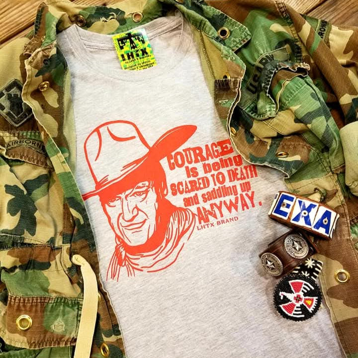 COURAGE IS BEING SCARED TO DEATH AND SADDLING UP ANYWAY - JOHN WAYNE - SSCT